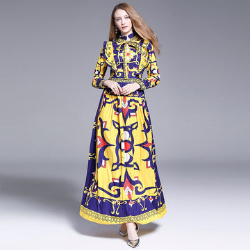 Plisowana sukienka maxi w nadruk
