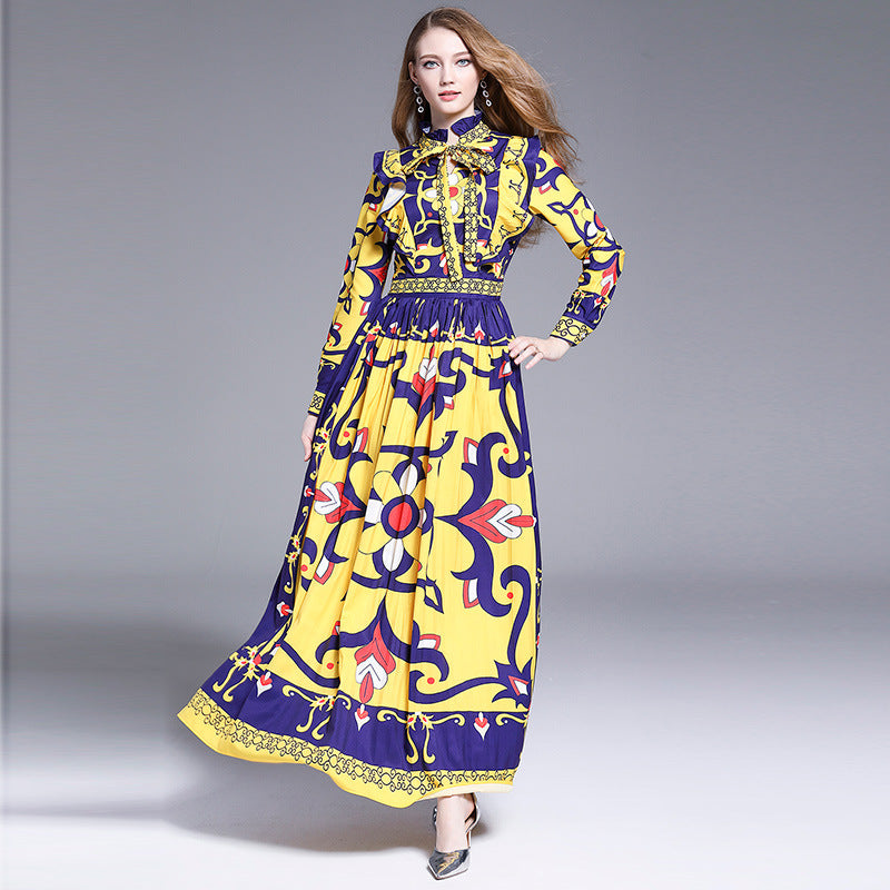 Plisowana sukienka maxi w nadruk